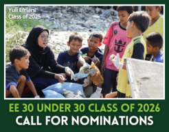 EE 30 Under 30 alum Yuli Efriani kneels with students around collected trash as part of an environmental education initiative. 