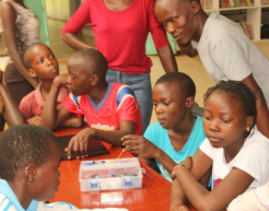 A group of Kenyan youth participate in a STEM workshop.