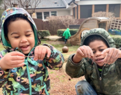 Two young kids at an outdoors playground