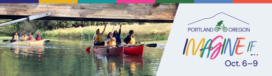 Four two-person canoes are paddled down a river, with the edge of a wooden bridge in the foreground. The "Imagine If..." logo, the Portland, Oregon logo, and "Oct. 6–9" are displayed to the right.